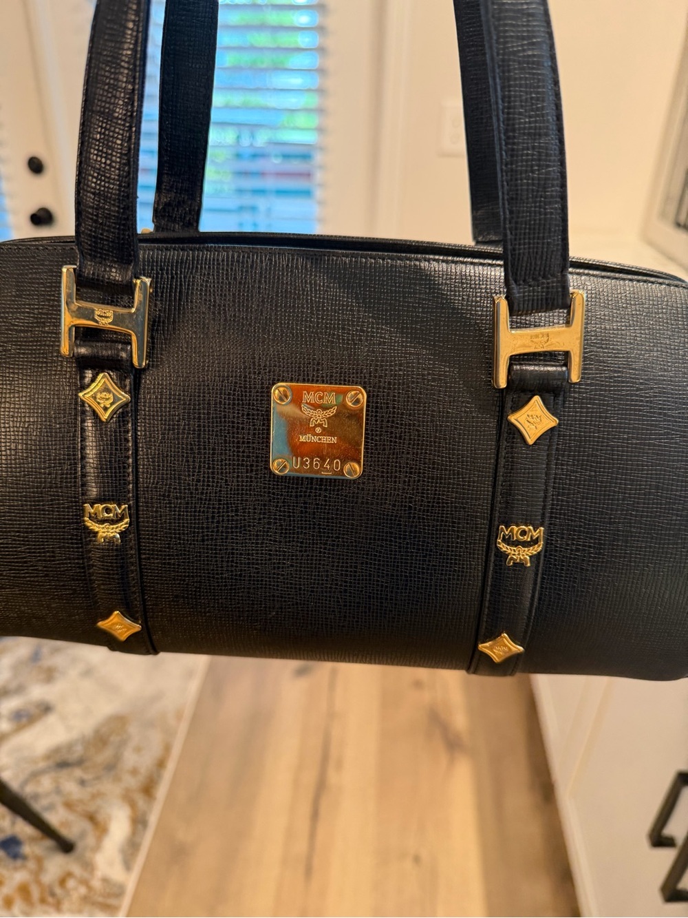 MCM Black Leather Barrel Tote with Gold Emblem Hardware